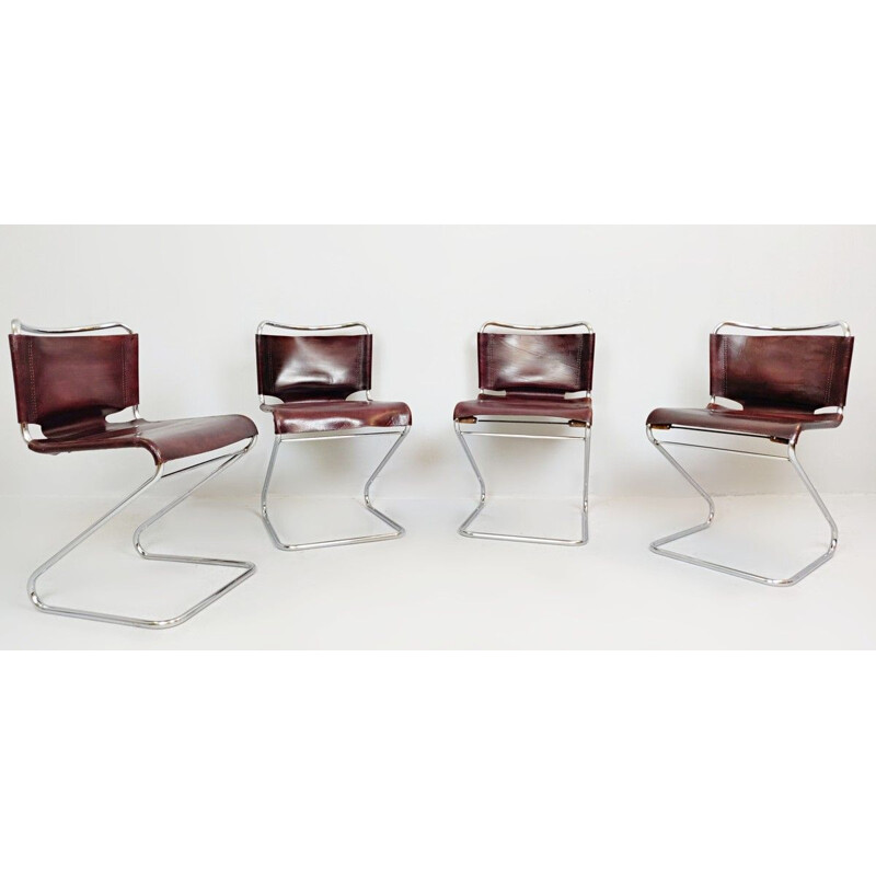Suite de quatre chaises vintage en cuir et chrome Italie 1970