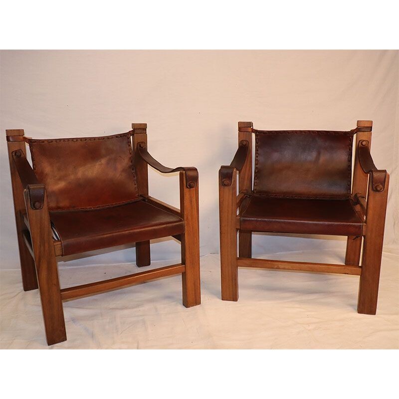 Paire de fauteuils vintage en cuir tendu et bois 1950