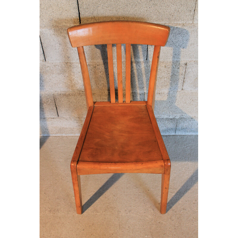 Suite de 4 chaises vintage bistrot Stella 1950