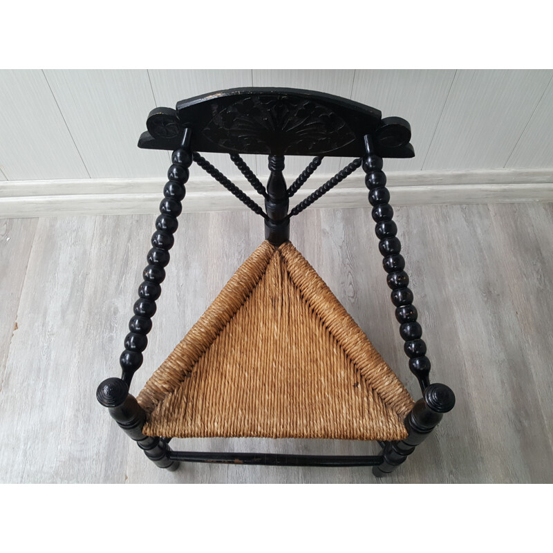 Vintage triangular chair on three legs