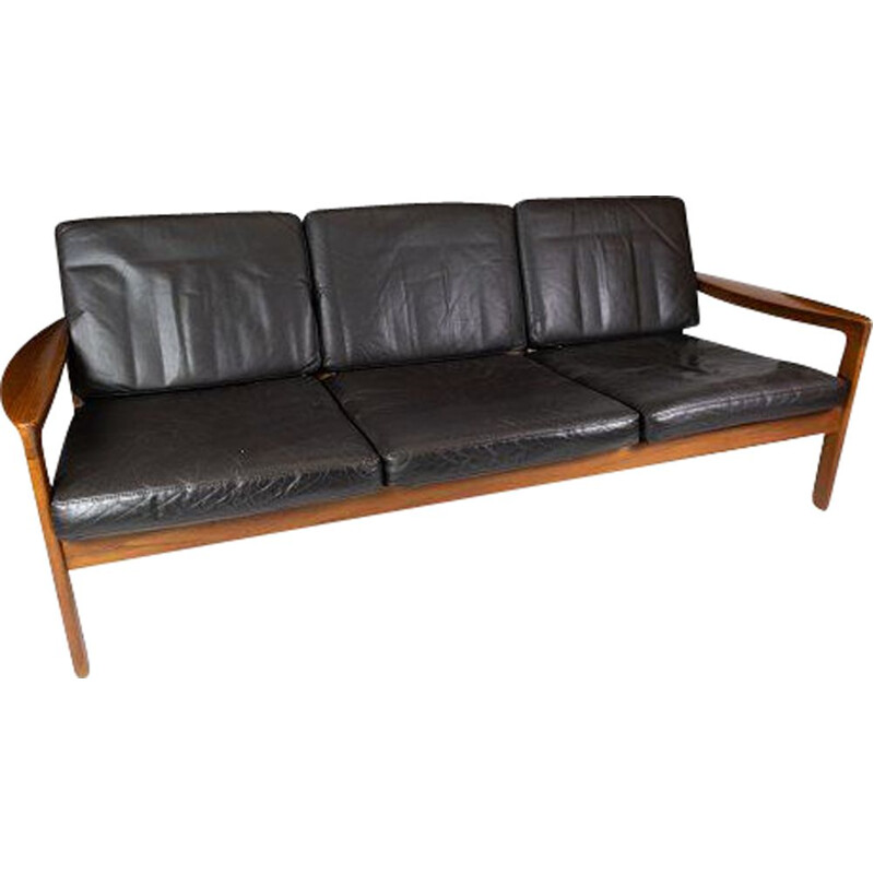 Vintage teak three seater sofa and upholstered with black leather by Arne  Vodder 1960s