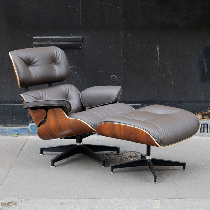 Vintage lounge chair and ottoman in rosewood by Charles and Ray Eames for Herman  Miller