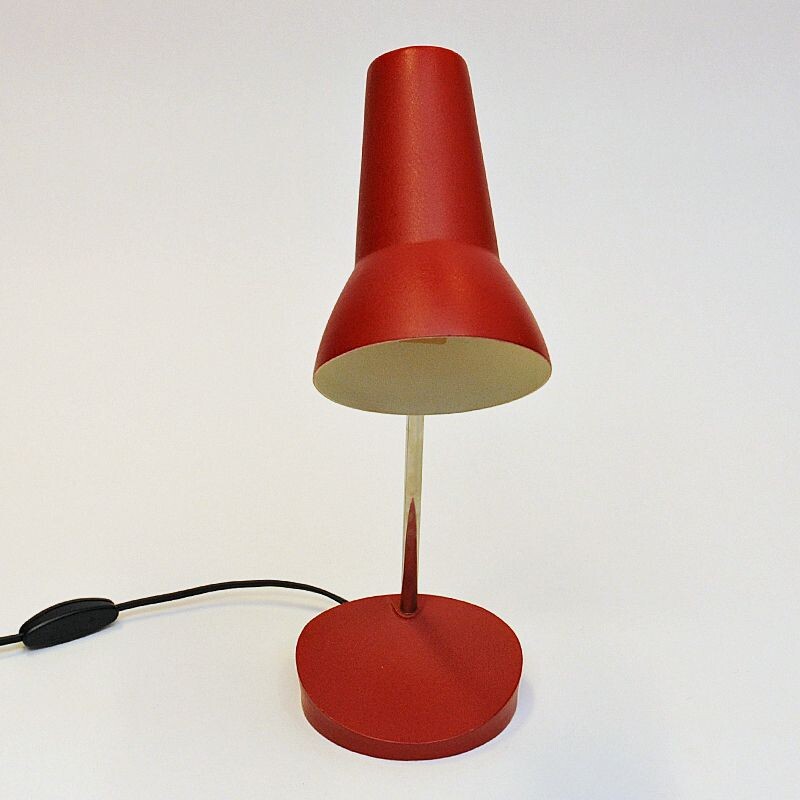 red metal desk lamp