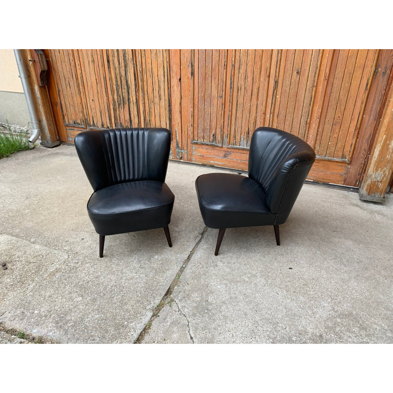 Pair of mid-century Sky black cocktail armchairs, 1950s