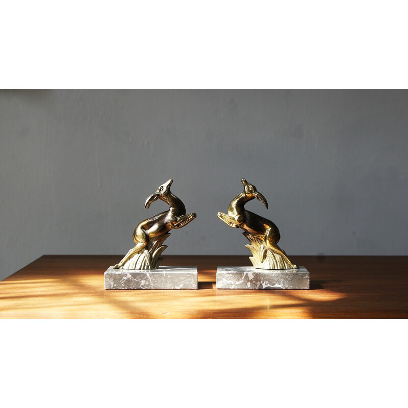 Pair of vintage Art Deco bookends springbok antelopes on marble bases, 1930s