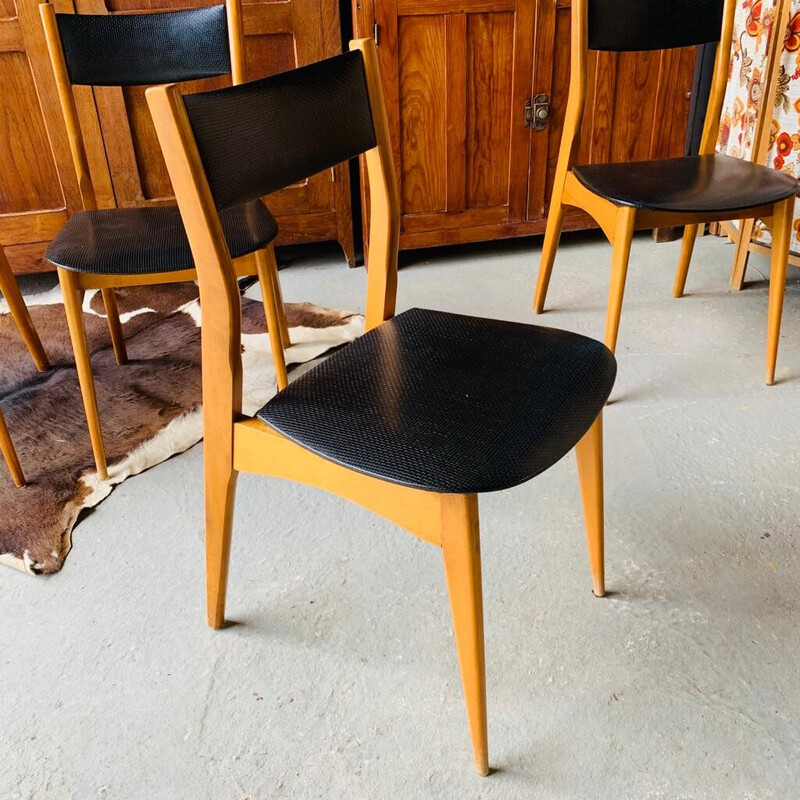Set of 4 vintage chairs in black skai and wood