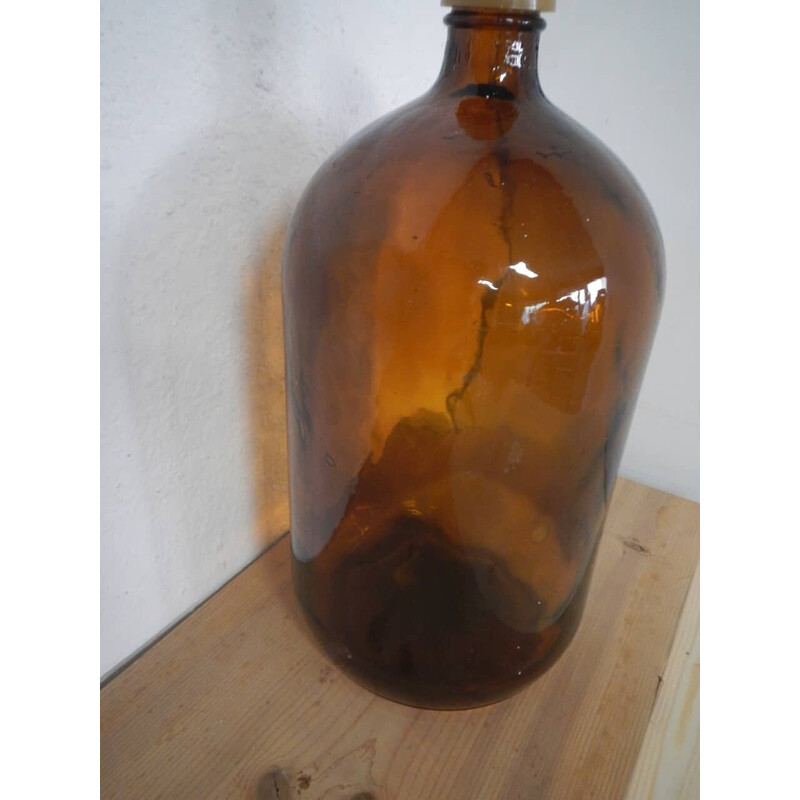 Garrafa de farmácia Vintage em vidro escuro com tampa de plástico