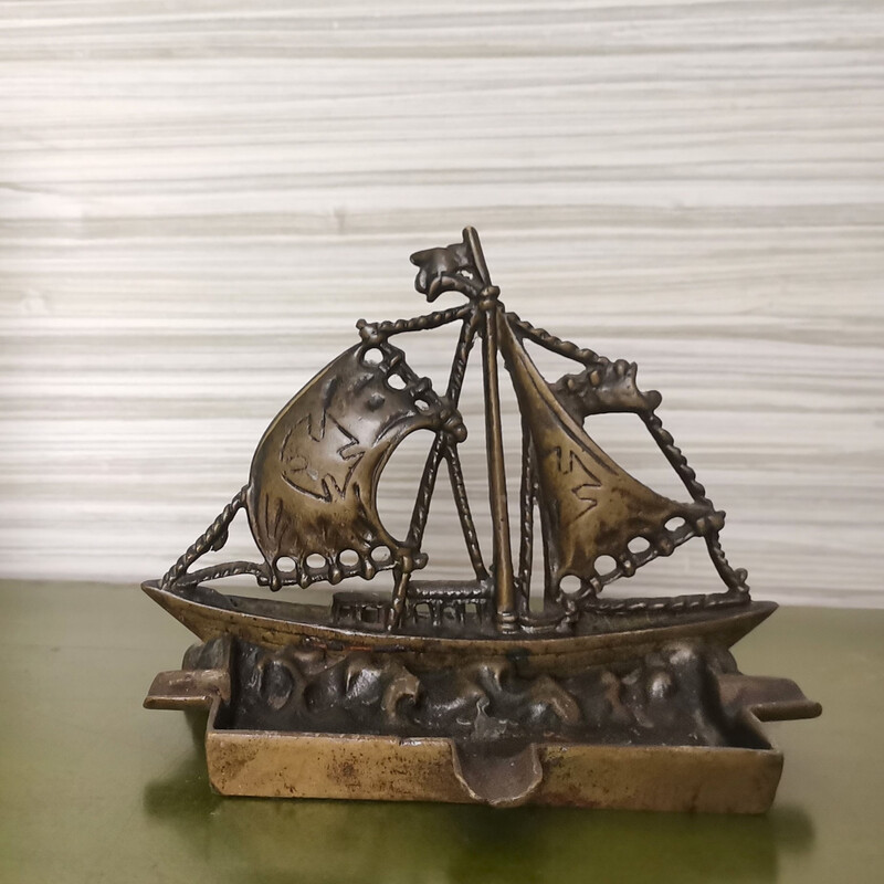 Vintage ashtray in the shape of a cast iron sailboat