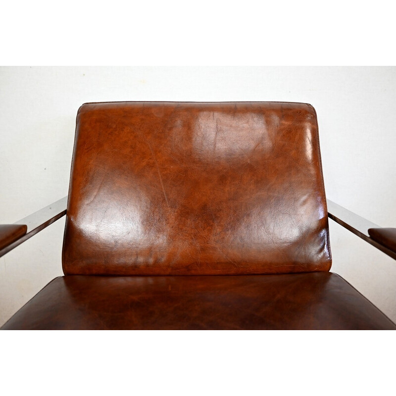 Paire de fauteuils vintage "Novatrend" en cuir et métal