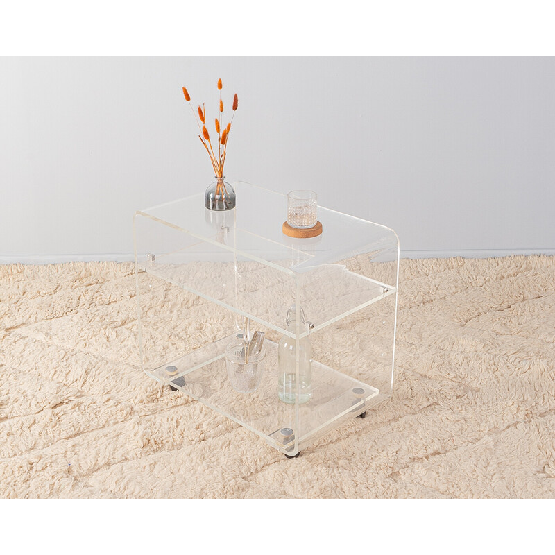 Vintage transparent acrylic side table with chrome-plated castors, Germany  1960s