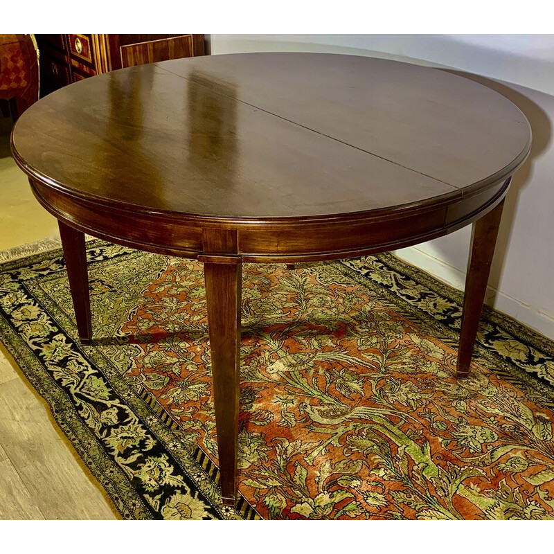 Vintage extendable round table in mahogany