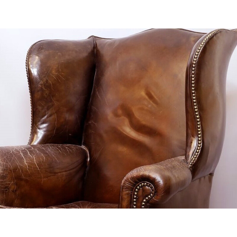 Vintage Wingback armchair in dark brown cracked leather