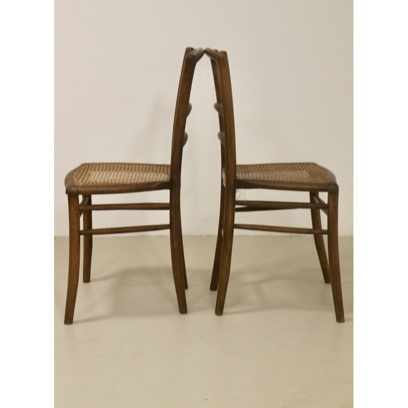 Pair of vintage bistro chairs with caning, 1950