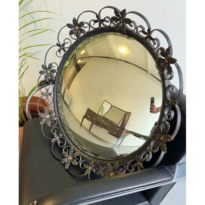 Miroir vintage convexe rond avec un cadre décoratif en métal