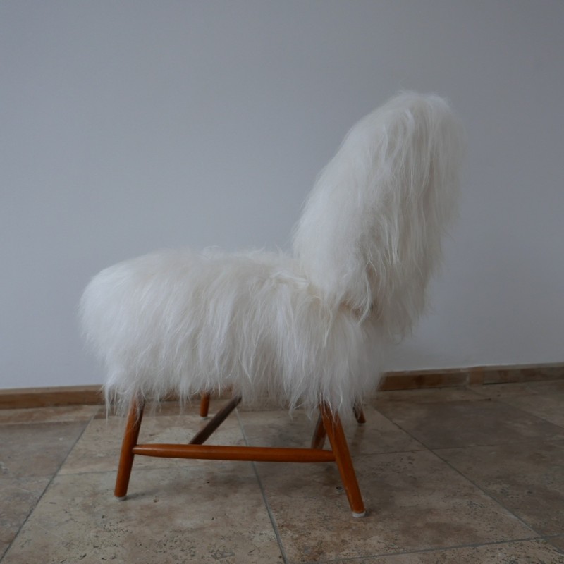 Vintage "TeVe" sheepskin chair by Alf Svensson for Studio Ljungs Industrier AB Malmö, Sweden 1950